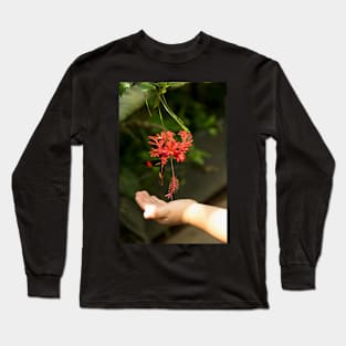 Child's hand touching beautiful butterfly Long Sleeve T-Shirt